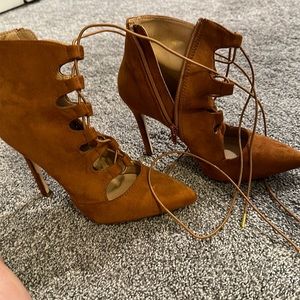 Super cute brownish suede lace up heel.